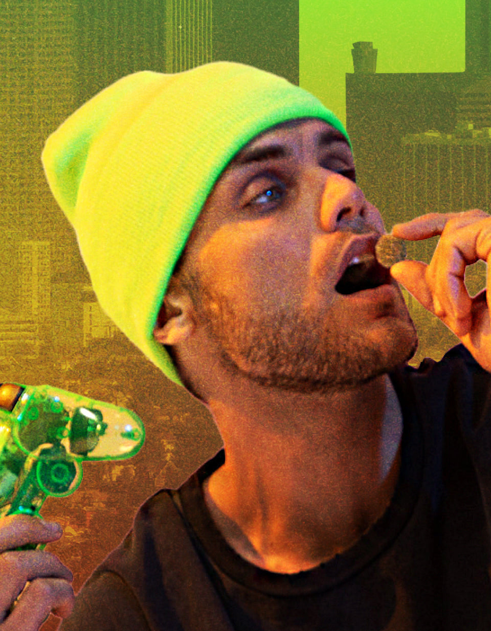 Man in neon green beanie about to eat a cannabis edible while holding a translucent green vaporizer against a stylized city skyline