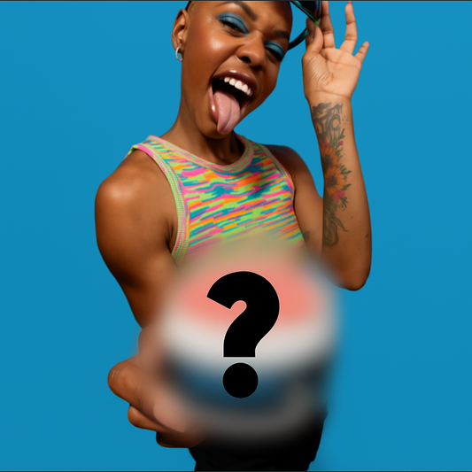 Smiling person in colorful tank top sticking out tongue, holding blurred object with large question mark ? on blue background